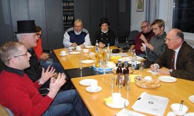 Gesprächsrunde bei den Kaminkehrern mit MdL Franz Maget (rechts)